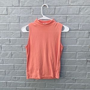 Used stretch blouse size Mediam Color peach without tag.